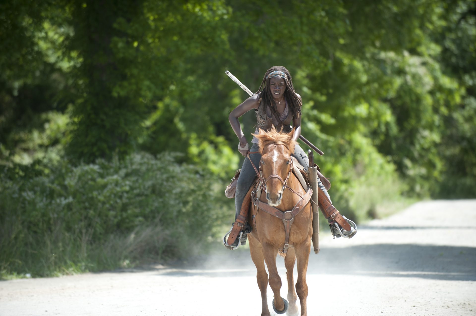 Michonne rides a horse