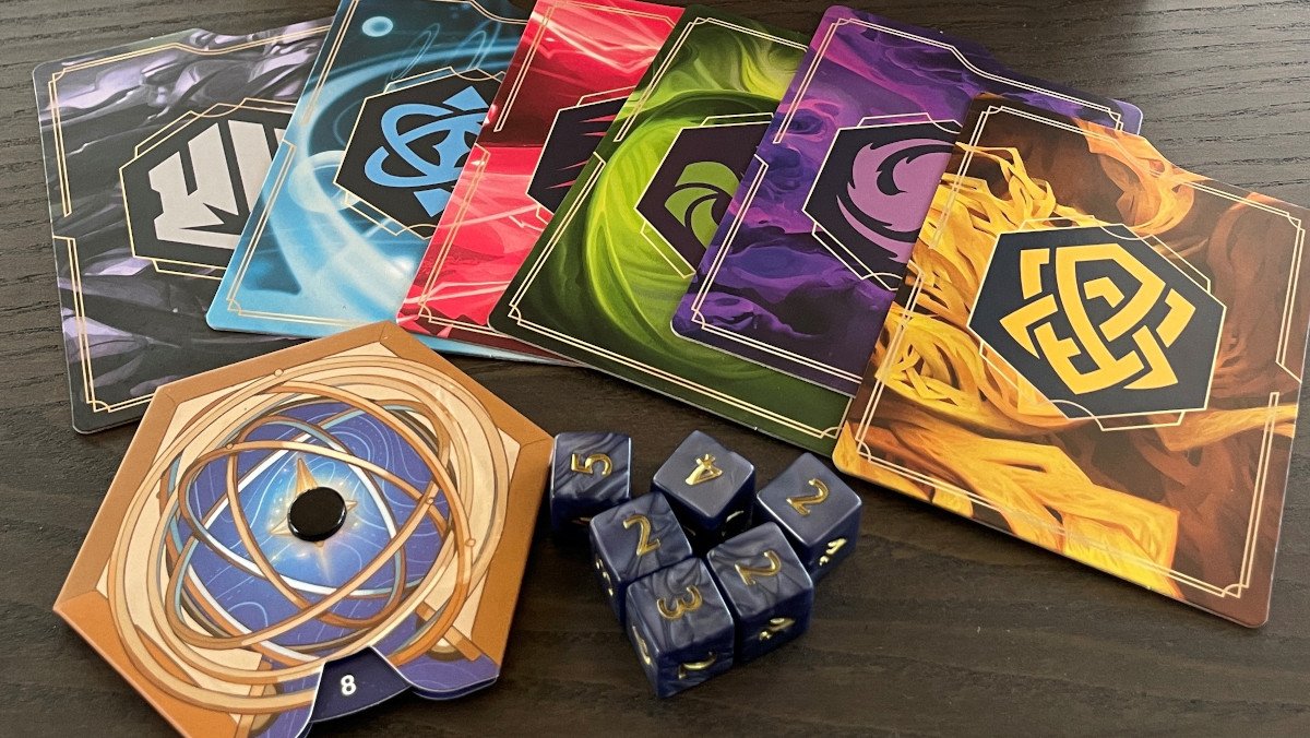 Disney Lorcana deck divider cards in every ink color, a lore tracker, and blue damage dice as part of the Into the Inklands Illumineer's Trove box