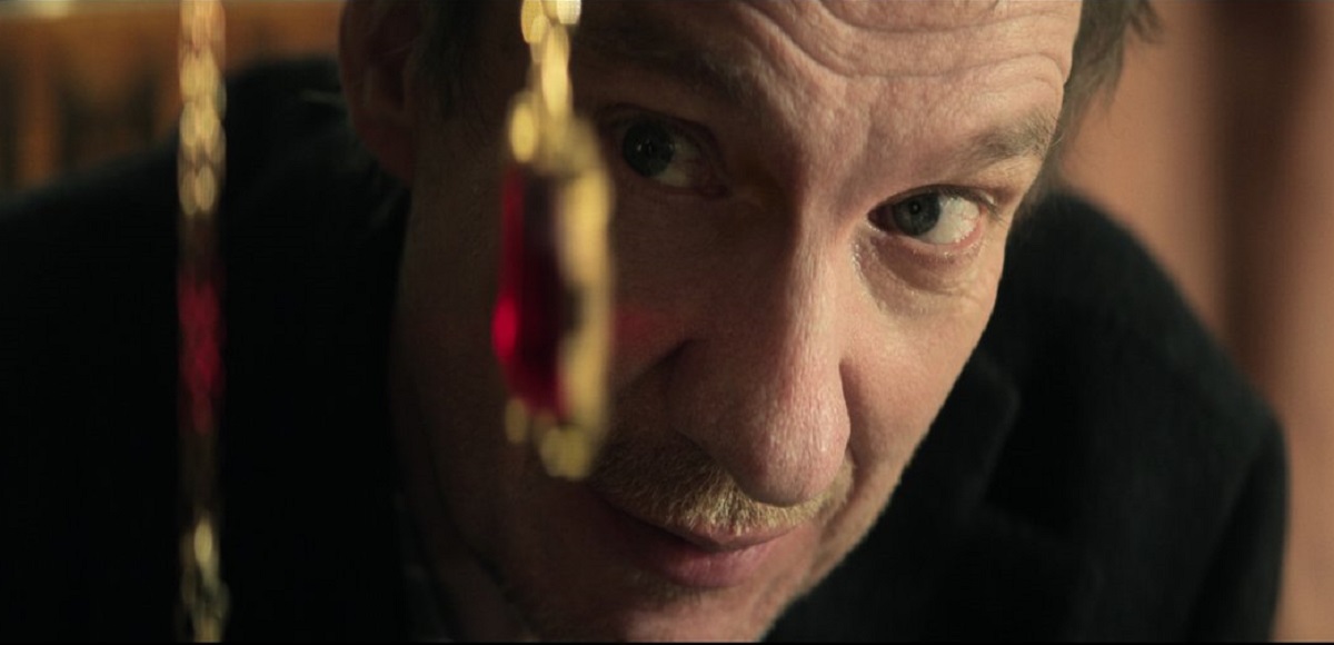 David Thewlis as John Dee, the man who stole Dream's gemstone.