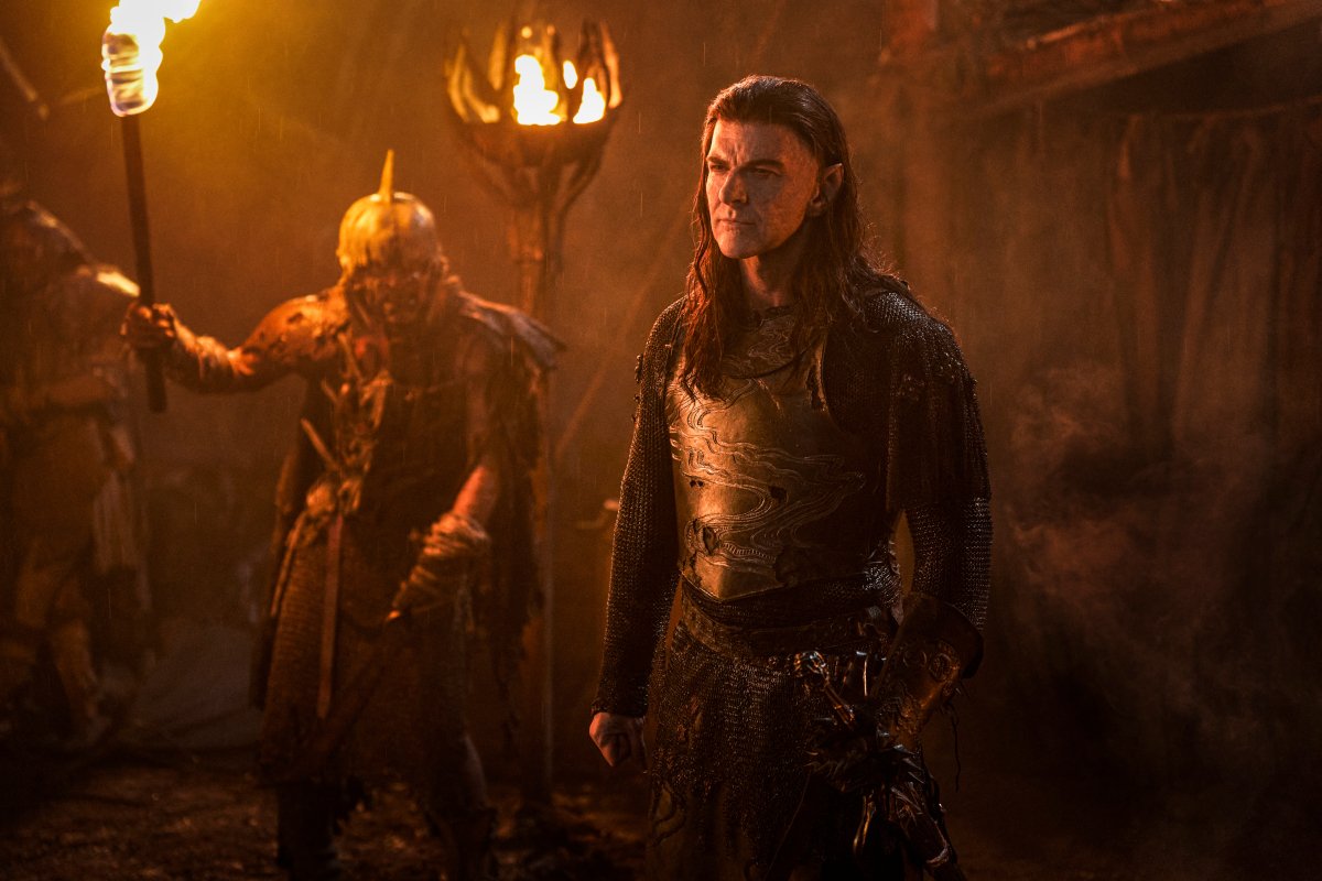 Adar with an orc in the background  in The Rings of Power season two