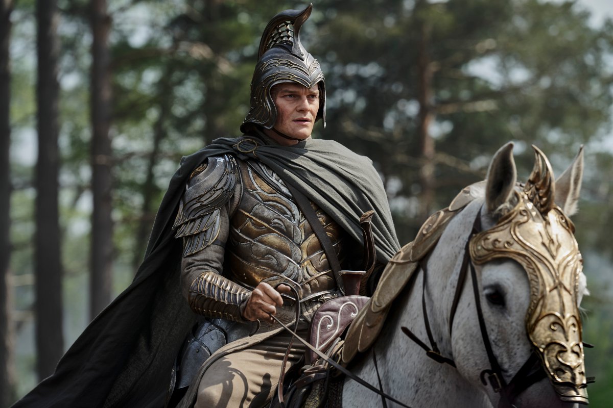 Elrond in armor riding a horse  in The Rings of Power season two