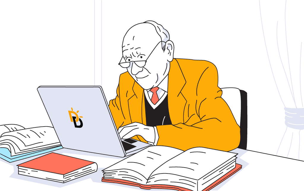 Older man behind a laptop